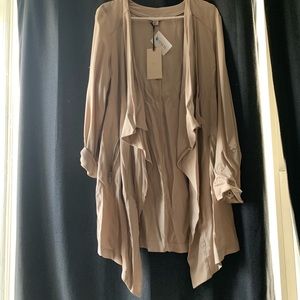 Beige flyaway trench coat